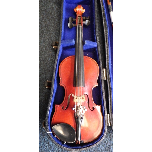 50 - A miniature cased Suzuki Violin