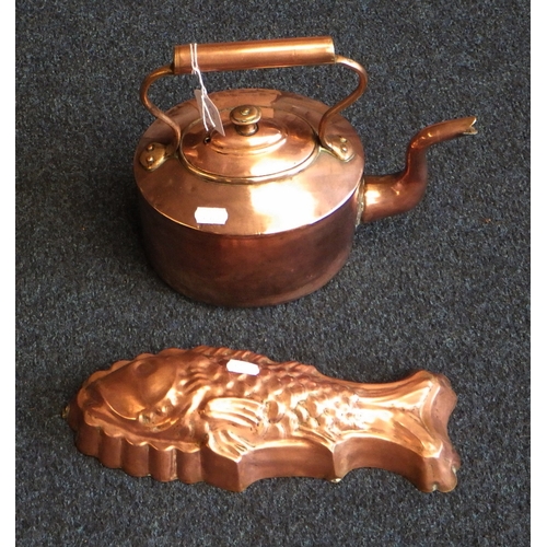 57 - A 19th C copper kettle together with a fish mould