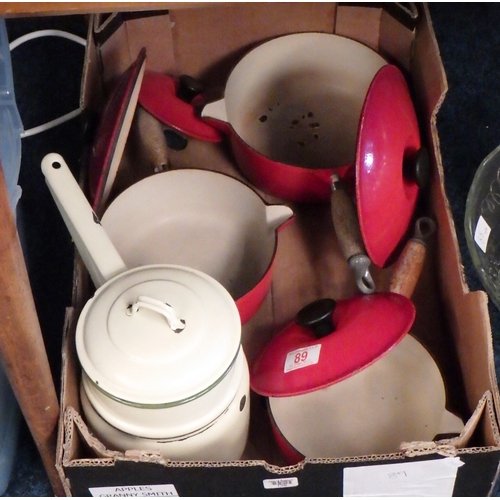 89 - Three red Le Creuset sauce pans together with an enamel pan, used