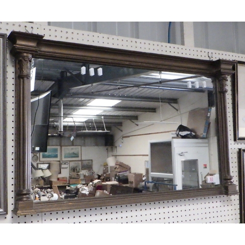 93 - An overpainted gilt framed mirror 85 x 54cm