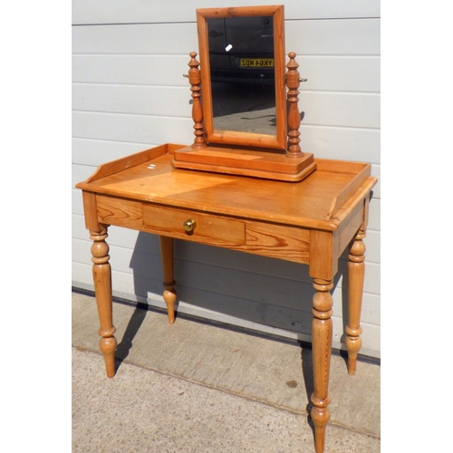 691 - A pine dressing/side table together with a toilet mirror, 89cm wide