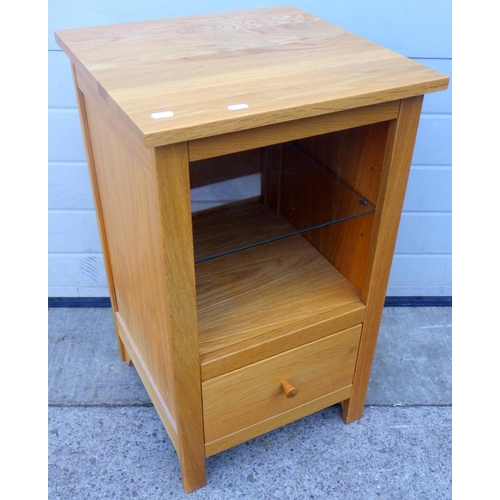 697 - A modern light oak side table, 45cm wide