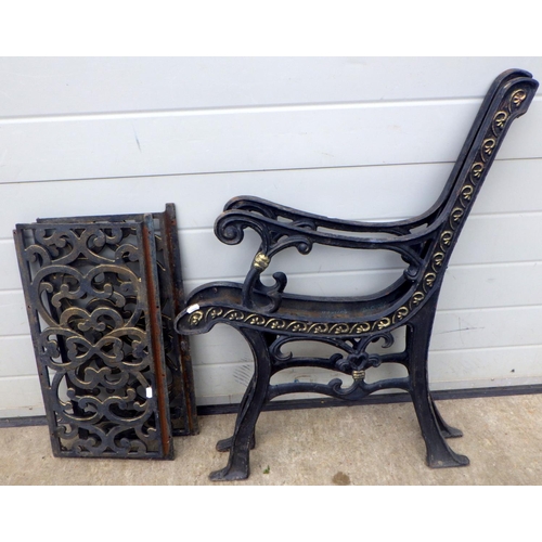 710 - A pair of cast iron bench ends