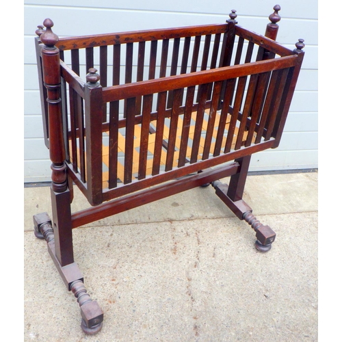 714 - A mahogany cradle, repair