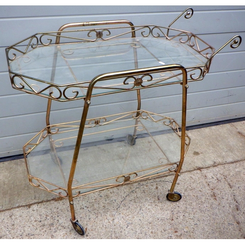 719 - A two tier metal trolley missing handle