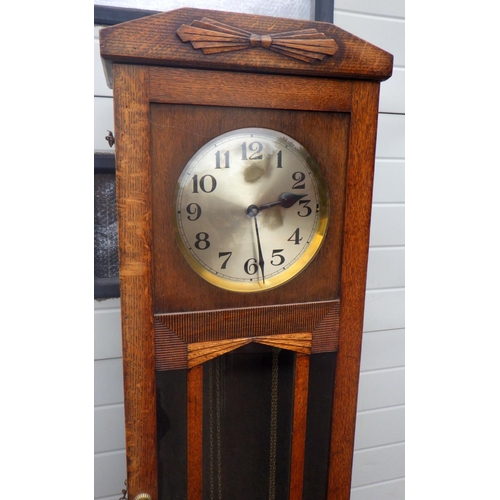 727 - A 1930's oak 3 weight longcase clock, 192cm tall