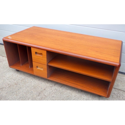 729 - A rectangular teak coffee table, 121cm long