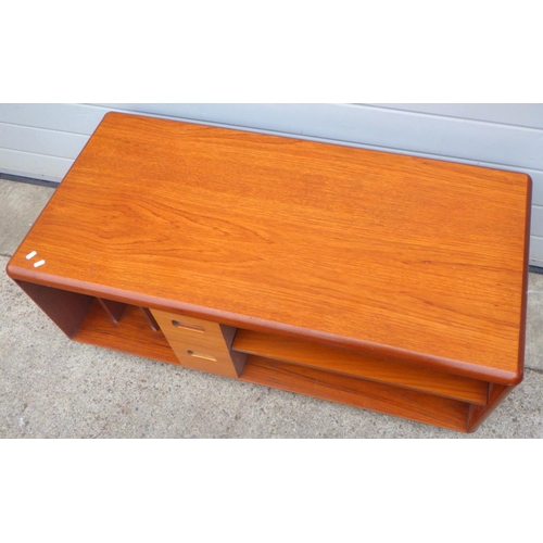 729 - A rectangular teak coffee table, 121cm long