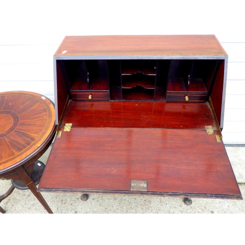 736 - An Edwardian mahogany bureau on cabriole legs together with a circular occasional table (a/f) (2)