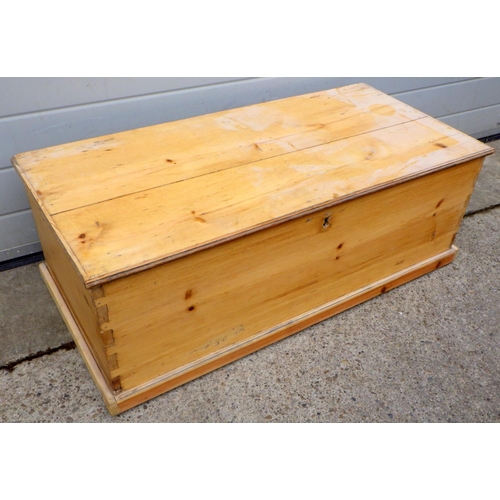 751 - A stripped pine blanket box, 102cm long