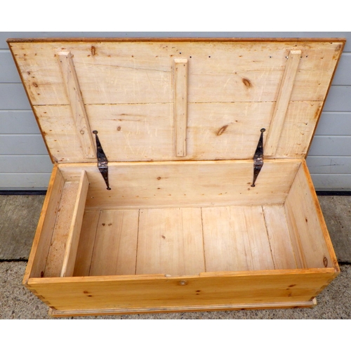 751 - A stripped pine blanket box, 102cm long