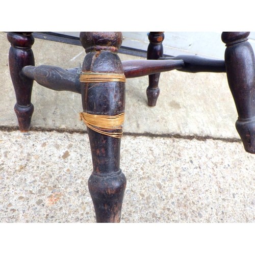 756 - A 19th cen child's Windsor chair, a/f repair