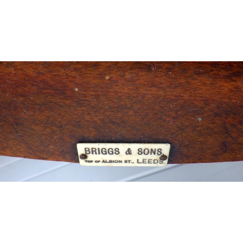 762 - An Edwardian child's chair, missing front rail, with label Briggs & Son