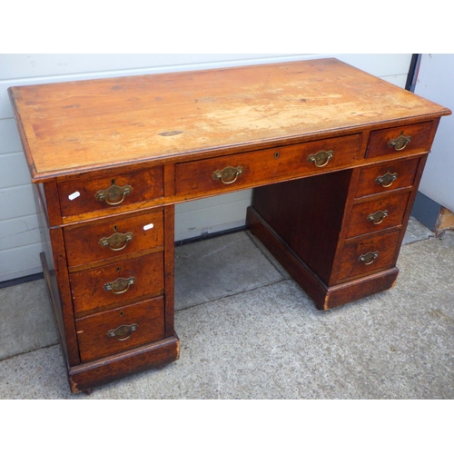 764 - An Edwardian pedestal desk, 123cm wide (a/f)