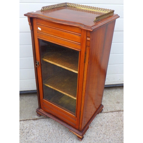 769 - An Edwardian music cabinet with pierced gallery, 49cm wide