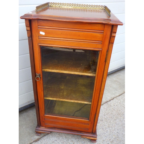 769 - An Edwardian music cabinet with pierced gallery, 49cm wide