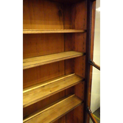 775 - A Victorian mahogany bookcase section on a later base, one side not finished, 143cm wide