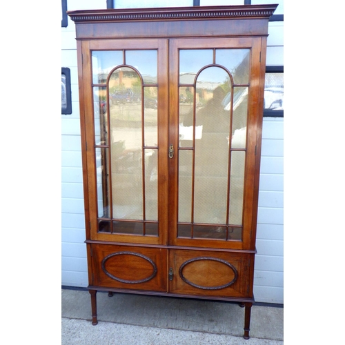 776 - An Edwardian mahogany display cabinet, 115cm wide