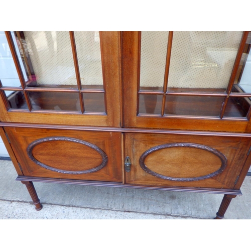 776 - An Edwardian mahogany display cabinet, 115cm wide