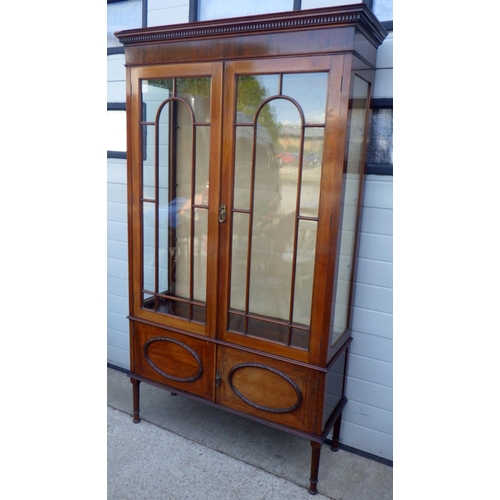 776 - An Edwardian mahogany display cabinet, 115cm wide