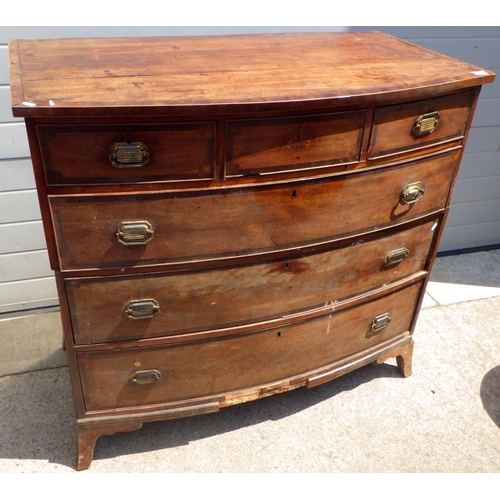 781 - A 19th cen two section bowfronted chest of drawers, a/f missing some moulding, 115cm wide