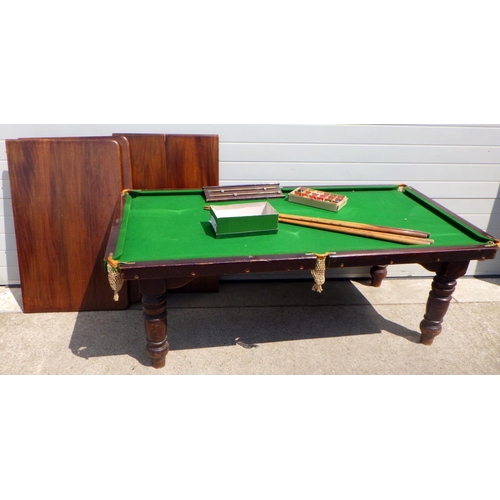 797 - A snooker dining table having slate bed with label The Tom Newman, balls, cues etc 197cm long