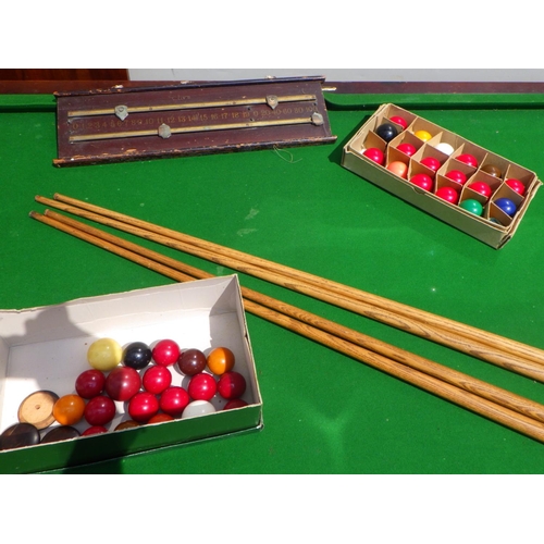 797 - A snooker dining table having slate bed with label The Tom Newman, balls, cues etc 197cm long