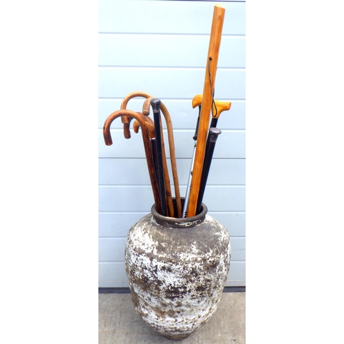 800 - Various walking sticks etc within a pot