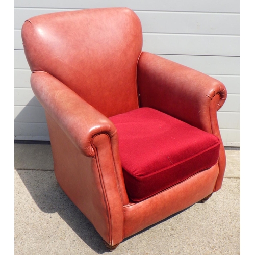 802 - A Thomas Lloyd leather easy chair with later cushion