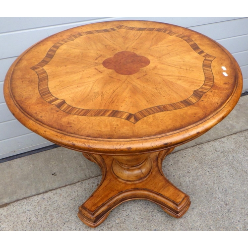 827 - A reproduction inlaid circular centre table, 92cm across