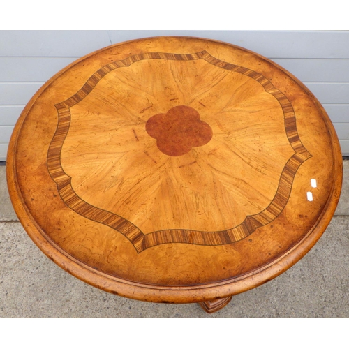 827 - A reproduction inlaid circular centre table, 92cm across