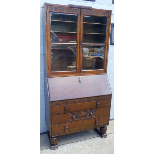 851 - An oak bureau bookcase 91cm wide