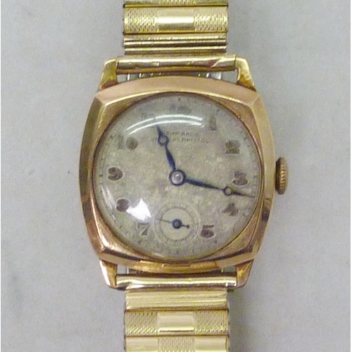 30 - A Kemp Bros Union St Bristol wristwatch comprising a manual wind lever movement in a 9ct gold cushio... 