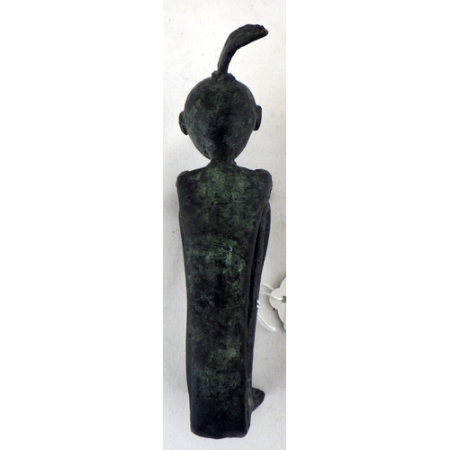 259 - An African stylized figurine, cast bronze. 15cm tall