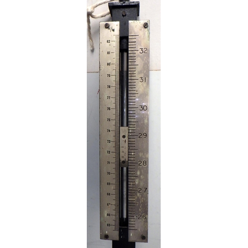 28 - A metal ON stick barometer serial no 6763