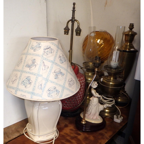 86 - Seven various table lamps