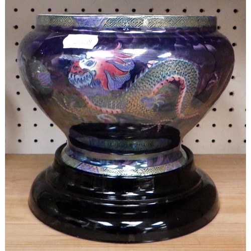 118 - A Maling lustre bowl having dragon motif decoration; a Victorian teapot having a printed motto desig... 