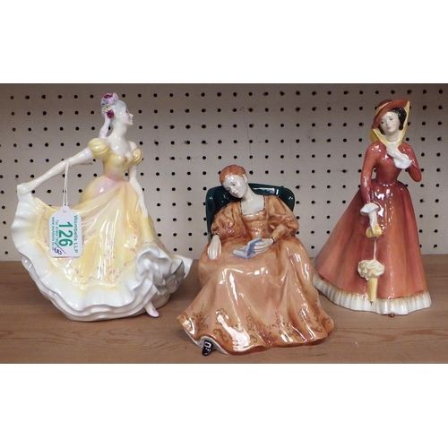 126 - Three Royal Doulton lady figurines.