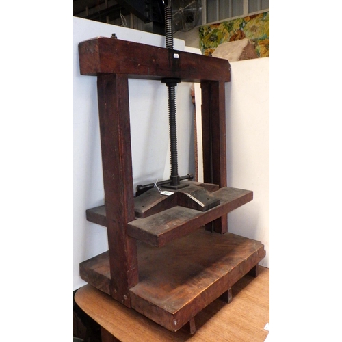 134 - A wooden-framed book press, 80cm tall to top rail, 64cm wide  Ex. York Minster Stores.