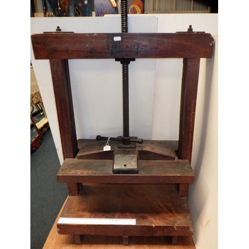 134 - A wooden-framed book press, 80cm tall to top rail, 64cm wide  Ex. York Minster Stores.