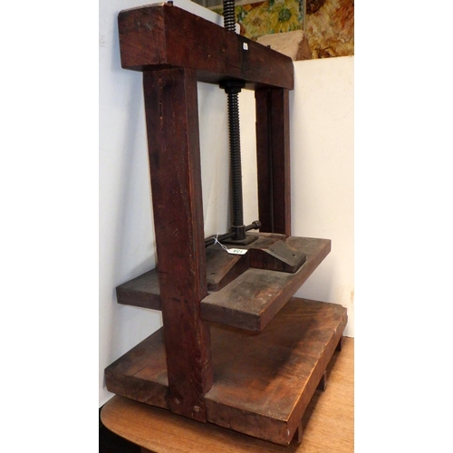 134 - A wooden-framed book press, 80cm tall to top rail, 64cm wide  Ex. York Minster Stores.