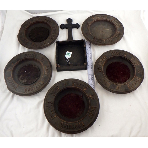 138 - Five turned and carved oak collection plates, each 24cm diameter; an oak collection box with cross h... 