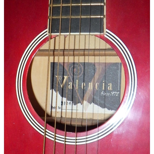 162 - A Valencia acoustic guitar; a ukulele.  (2)
