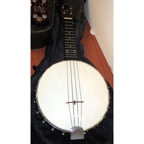 163 - A Melody-Uke banjo ukulele; another unsigned banjo ukulele. (2)