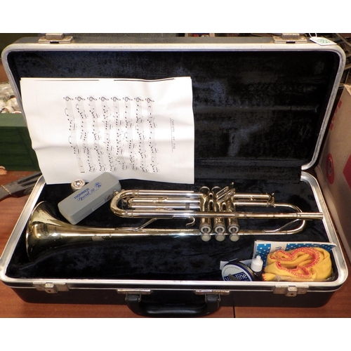 165 - A cased trumpet, a/f tarnished.
