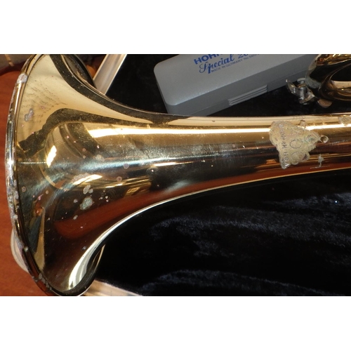 165 - A cased trumpet, a/f tarnished.