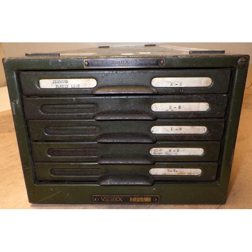 87 - A set of long green metal card filing drawers.