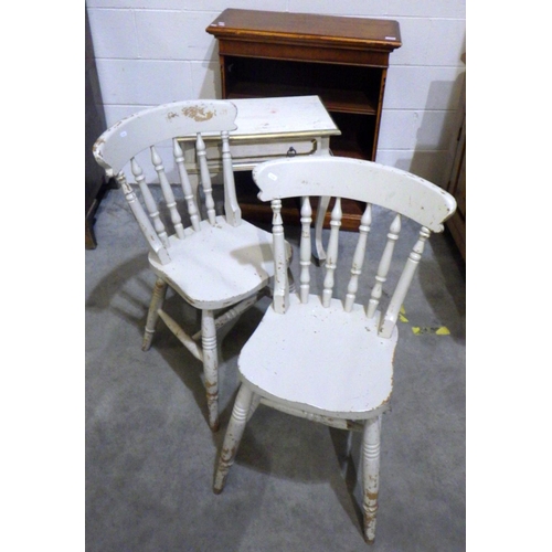 630 - A white painted low side table together with a pair of painted chairs and a low bookcase (4)