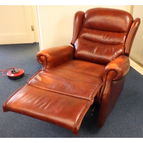 642 - A modern brown leather reclining electric arm chair