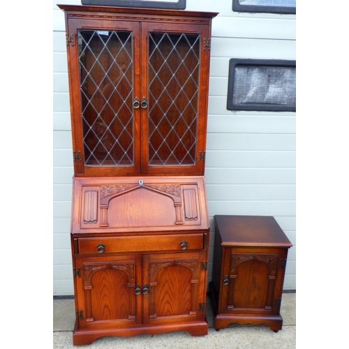 645 - An oak bureau bookcase together with a  matching side cupboard (2)